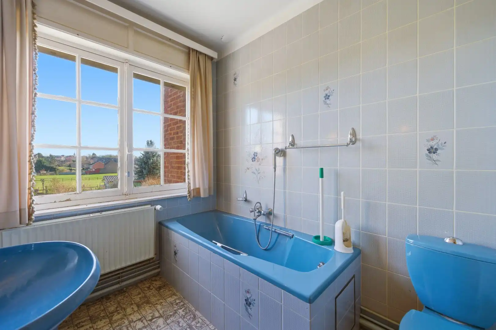 Op te frissen rijwoning met 2 slaapkamers en ruime tuin in Tienen foto 15