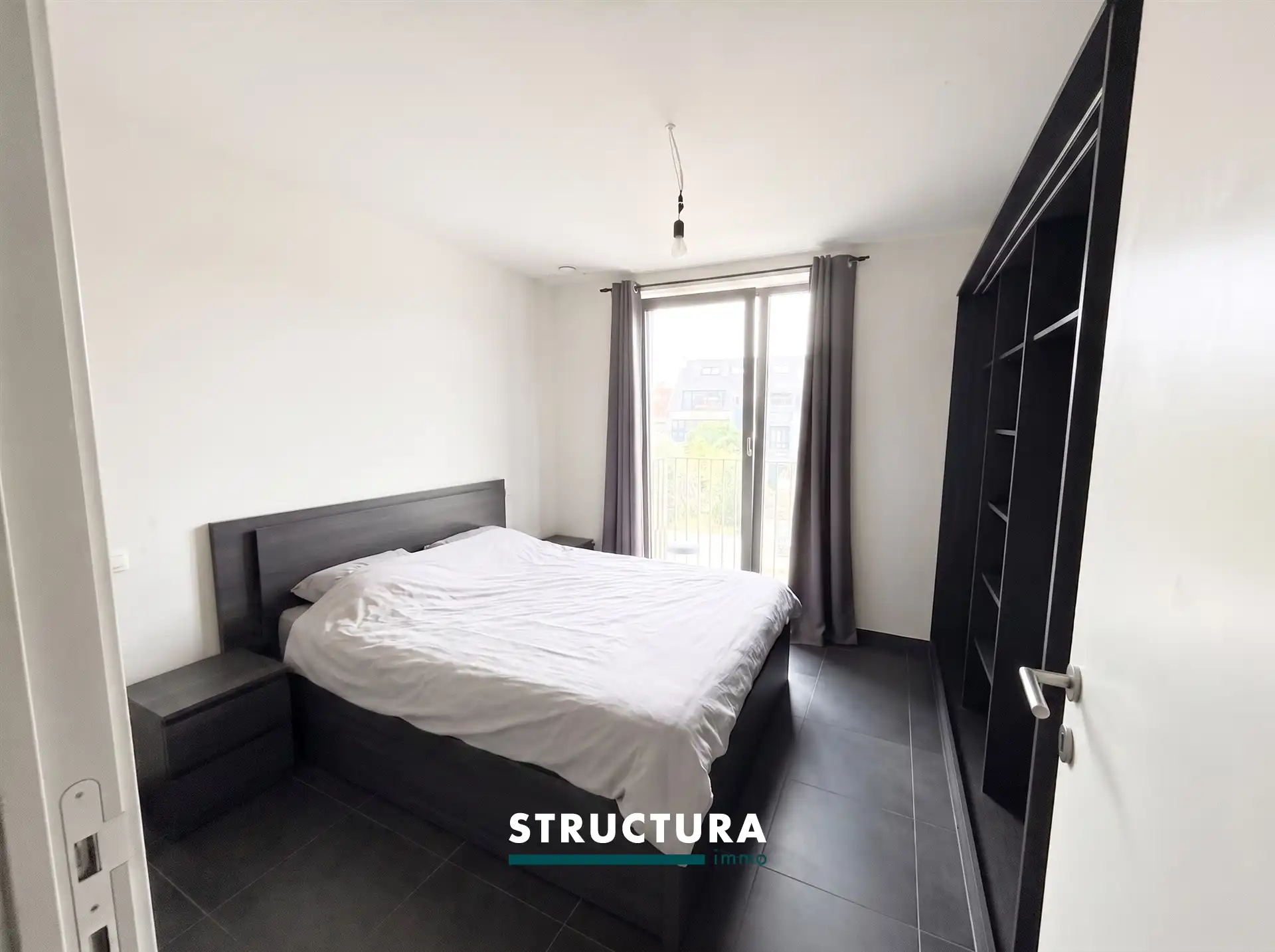 Appartement met ruim terras, staanplaats aan de Markt foto 4