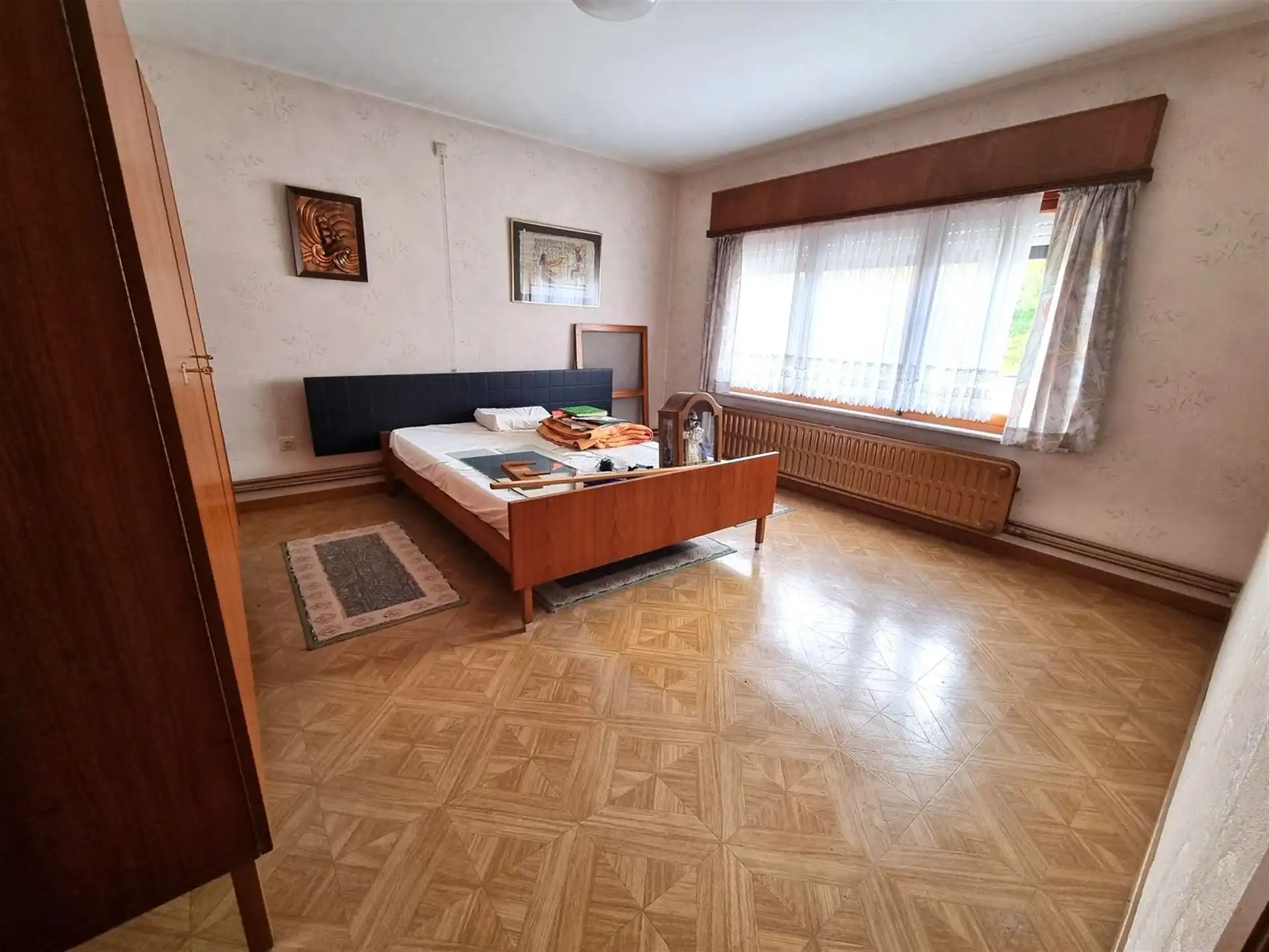 Woning met achterliggend magazijn op een totaal perceel van 19 are 58 ca. foto 12