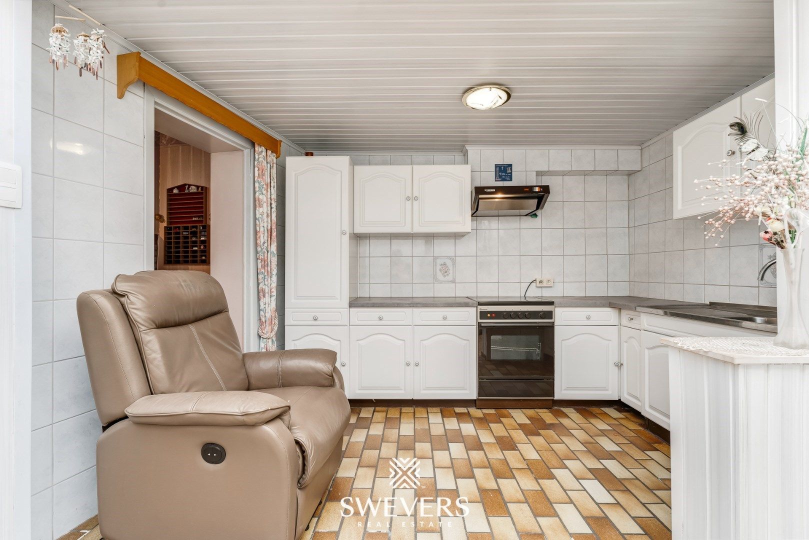 Ruime halfopen woning met renovatiepotentieel in Borgloon foto 14