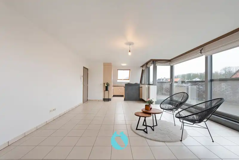 Dit prachtig en ruim appartement met één van de mooiste terrassen te Evergem is gelegen in de Kapellestraat foto 3