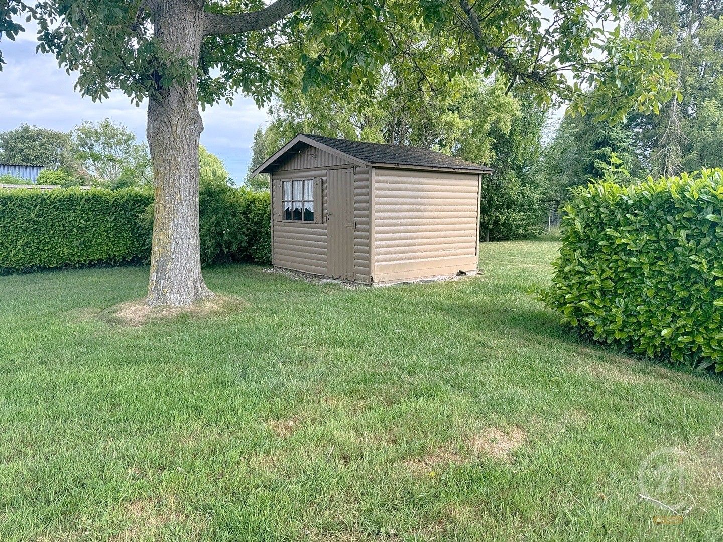 Karaktervolle woning met ruime tuin in het centrum van Leffinge foto 18