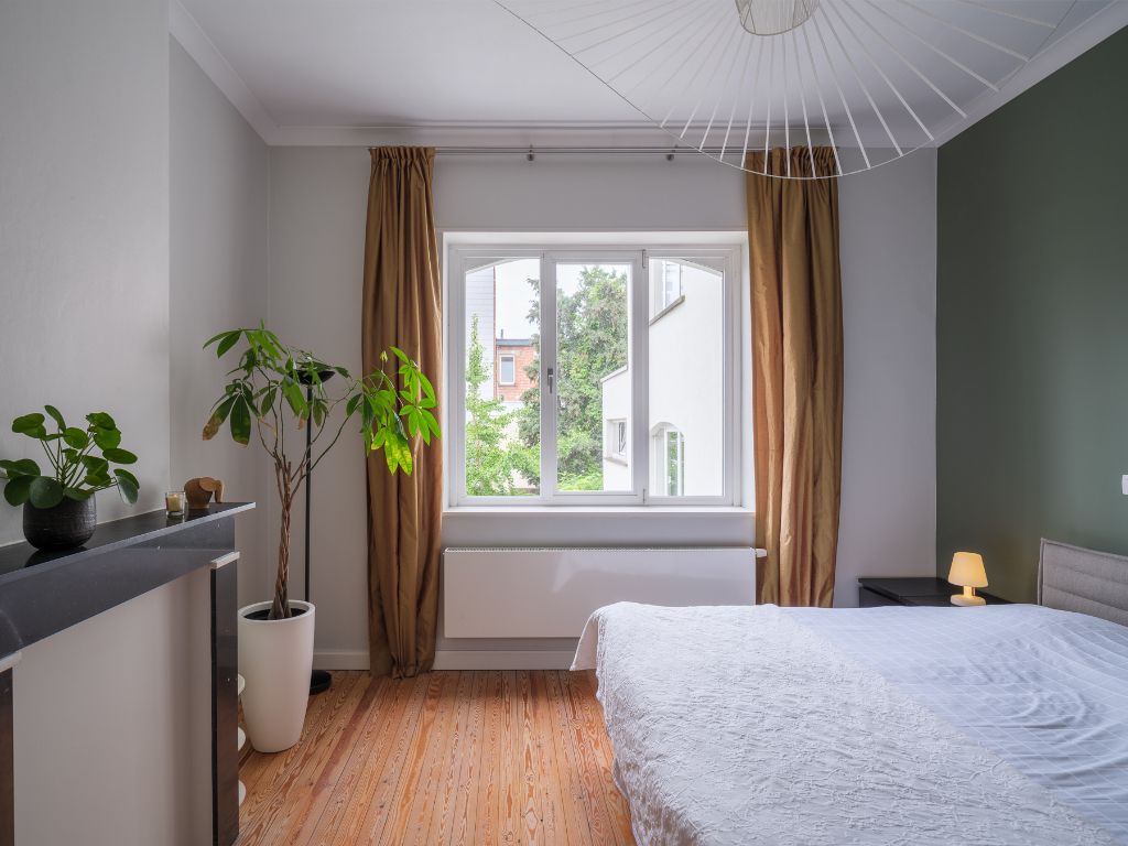 Omgeving Miljoenenkwartier - Bijzonder ruime herenwoning met tuin nabij het Paul de Smet de Naeyerpark. foto 17