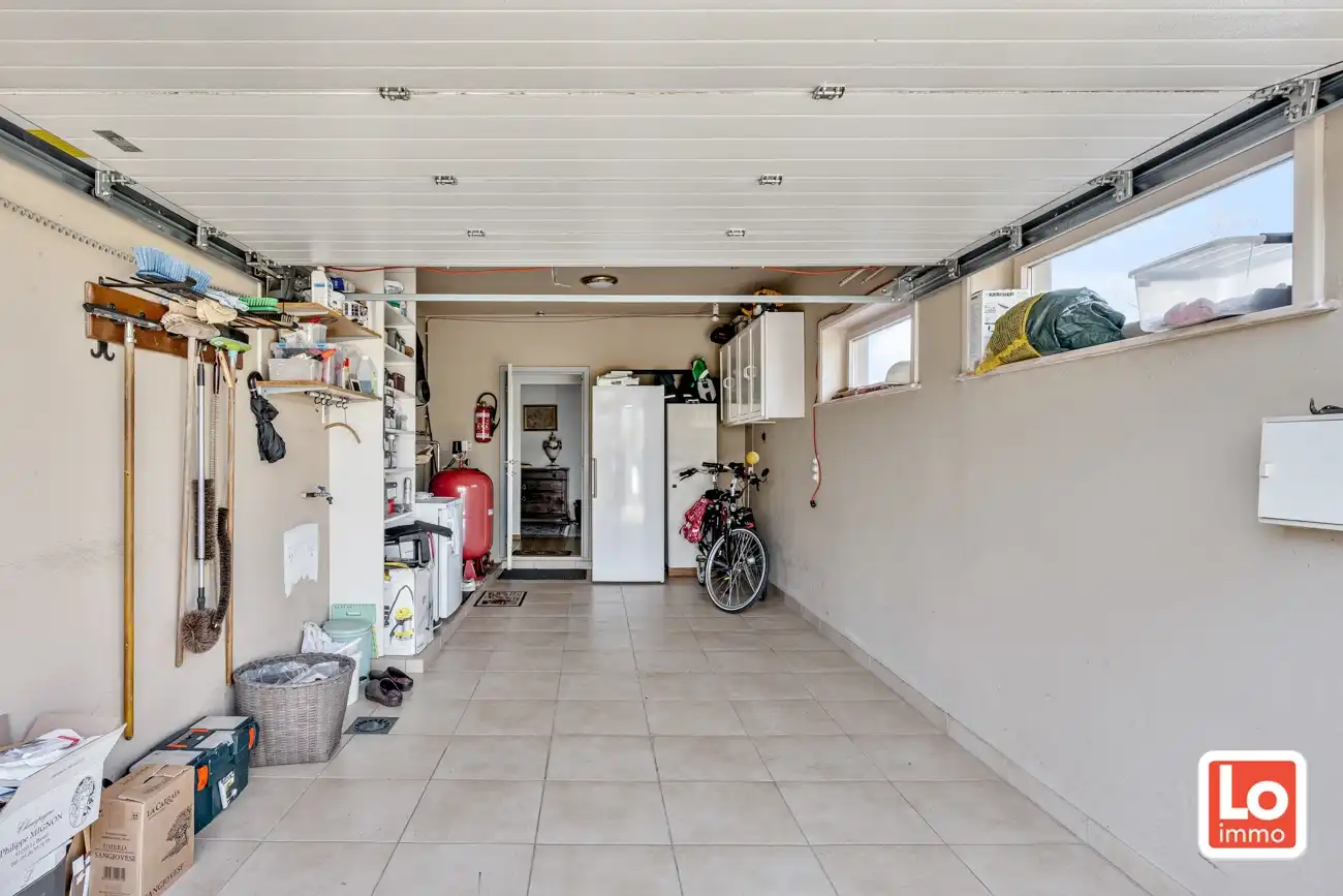 Degelijke open gelijkvloerse woning met inpandige garage en grote tuin op een groene toplocatie in Beervelde! foto 26