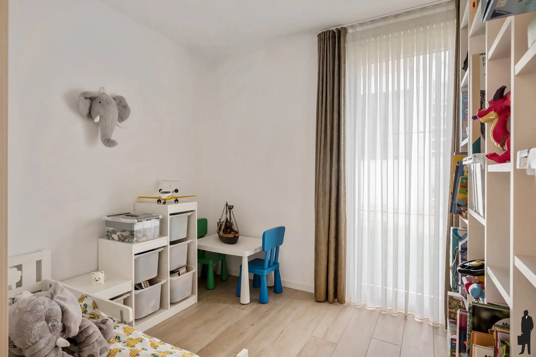Instapklaar gelijkvloers appartement met zonnige tuin foto 17