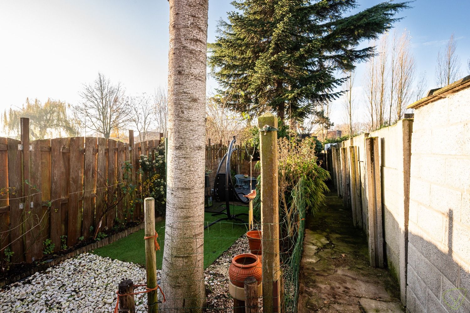 Charmante gesloten bebouwing met ruime tuin en renovatiepotentieel foto 20