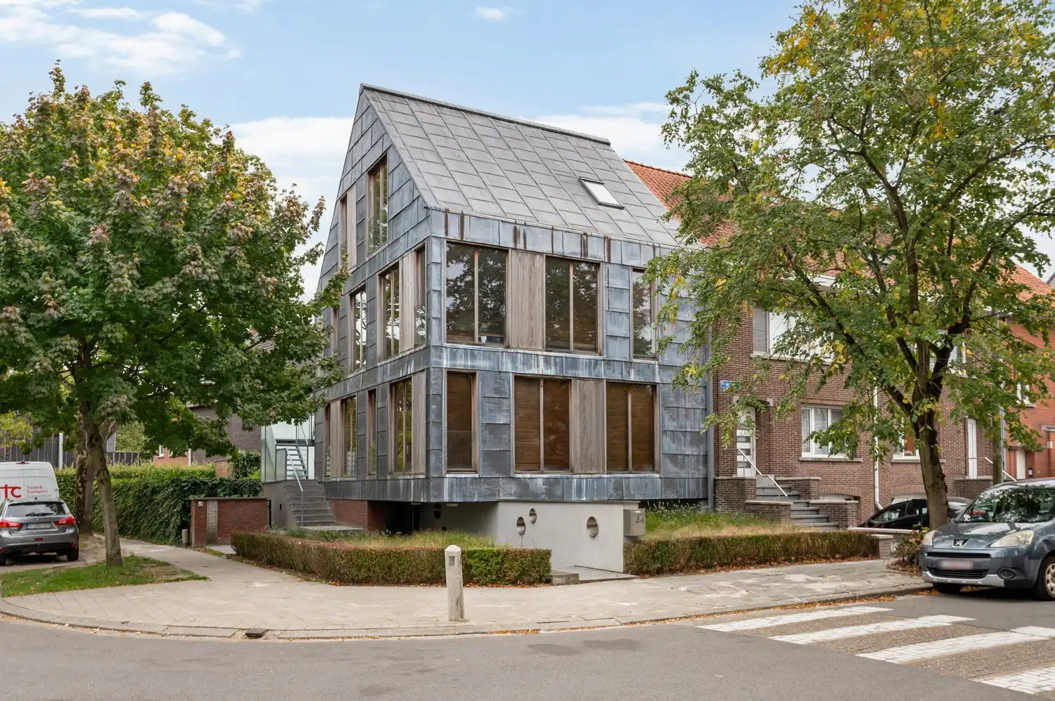 Gelijkvloers 2-slaapkamerappartement met tuin en garagebox foto 18