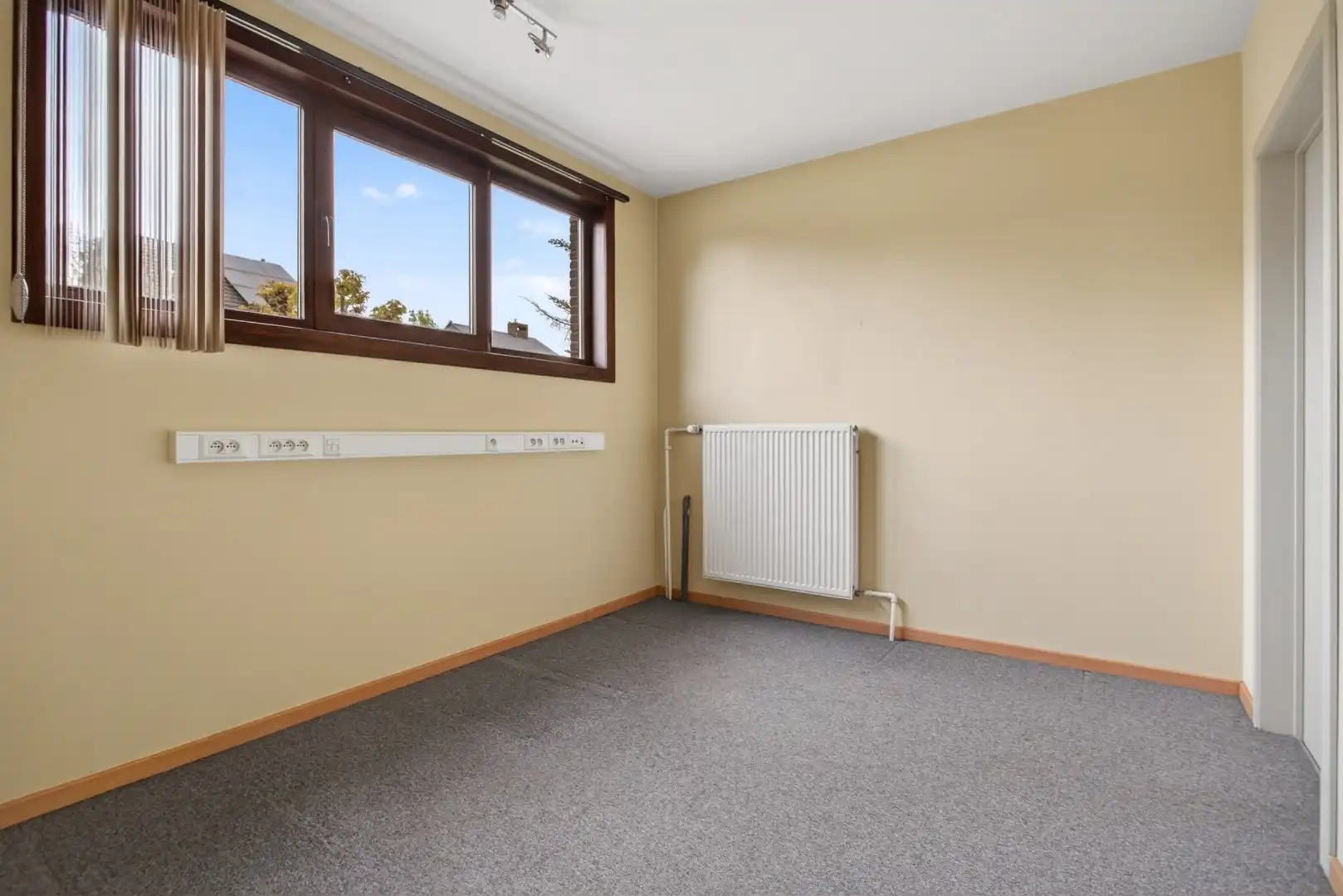 Ruime gelijkvloerse woning met veel potentieel op rustige ligging in Mol foto 25