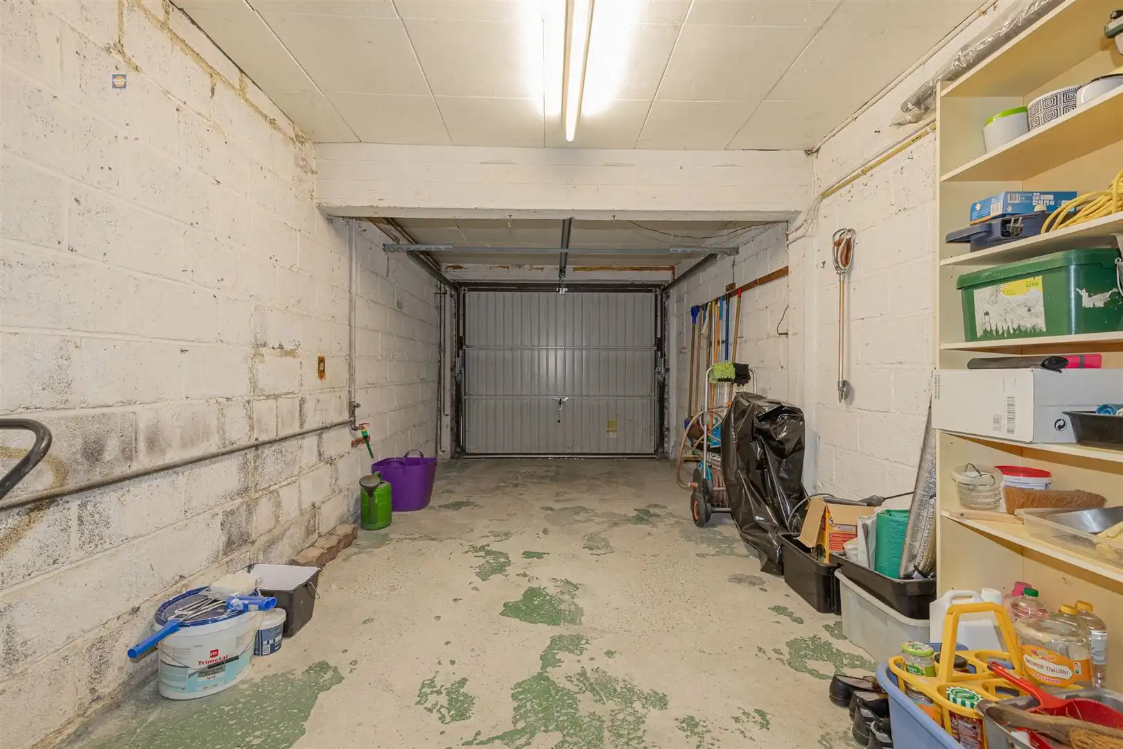 Gelijkvloers 2-slaapkamerappartement met tuin en garage foto 17