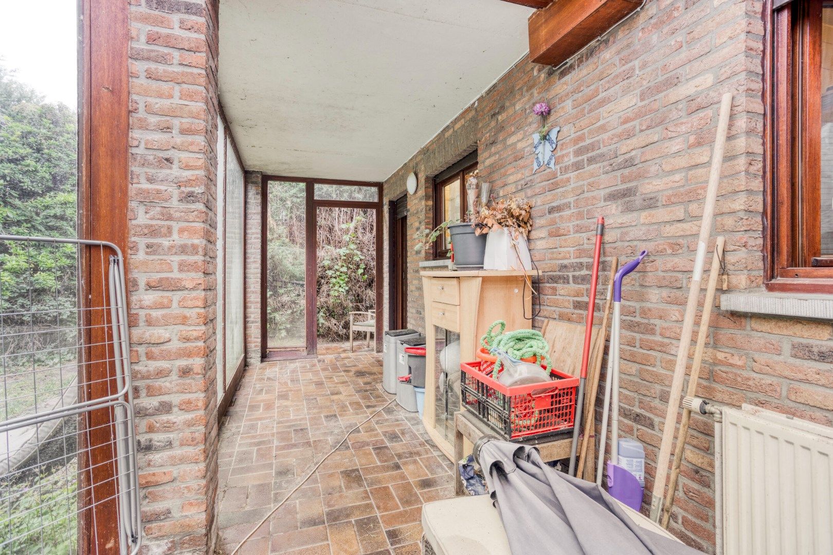 Gelijkvloerse woning met 2 slpks en inpandige garage op 824 m² !  foto 17