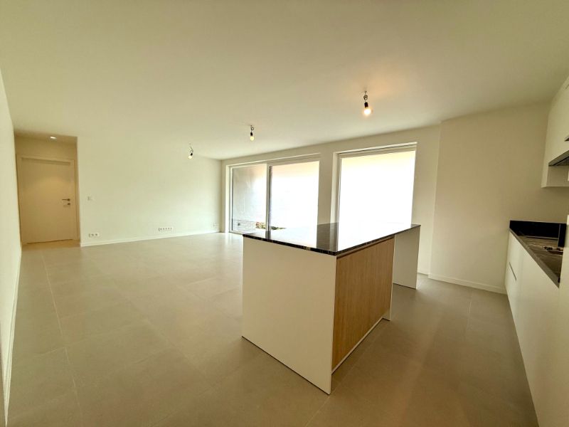 Gelijkvloers nieuwbouwappartement met 1 slaapkamer, zonnig terras en carport foto 5