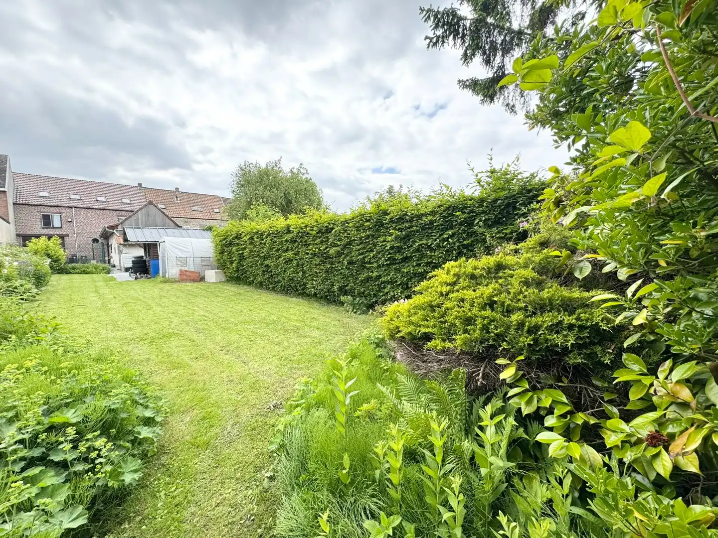 Ruime woning met 4 slaapkamers en grote tuin in centrum Oordegem foto 23