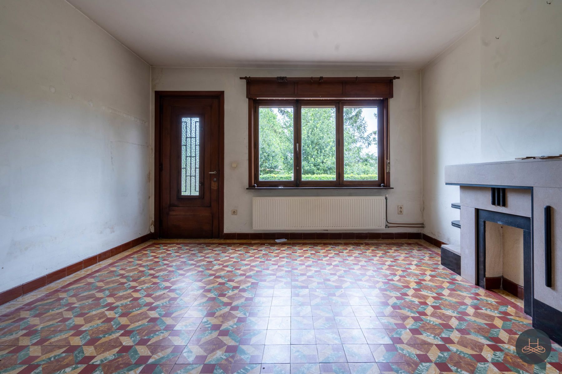 Achterliggende gezinswoning op rustgevend perceel foto 4