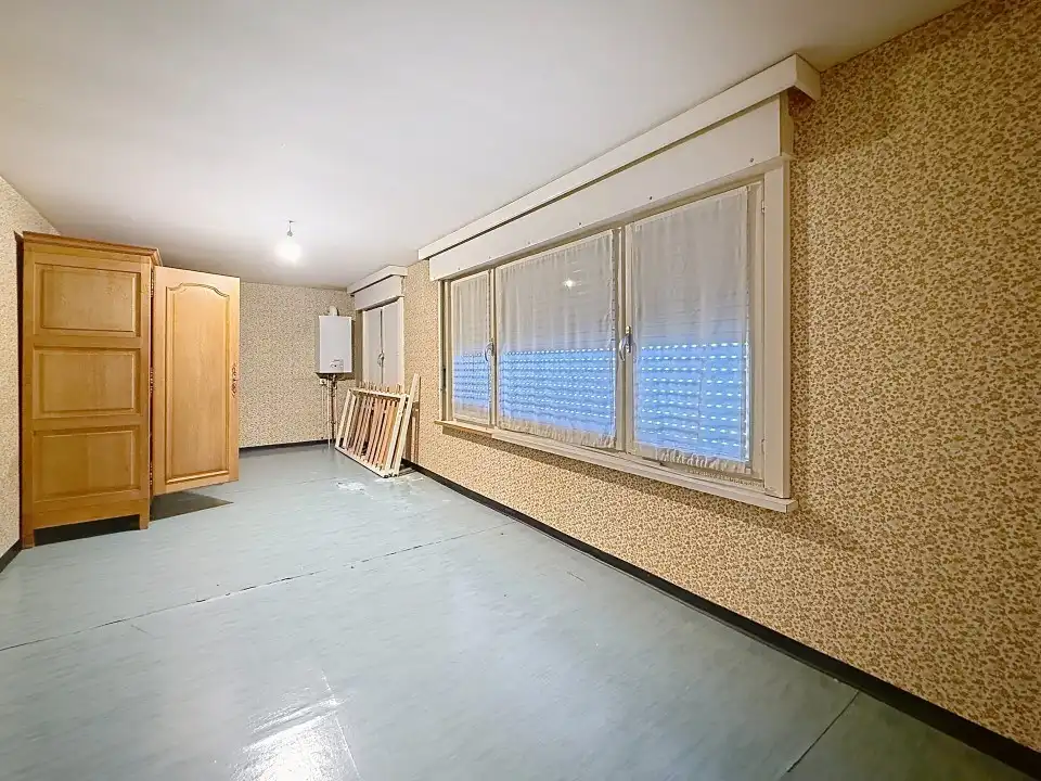 Centraal gelegen te renoveren ruime woning foto 11