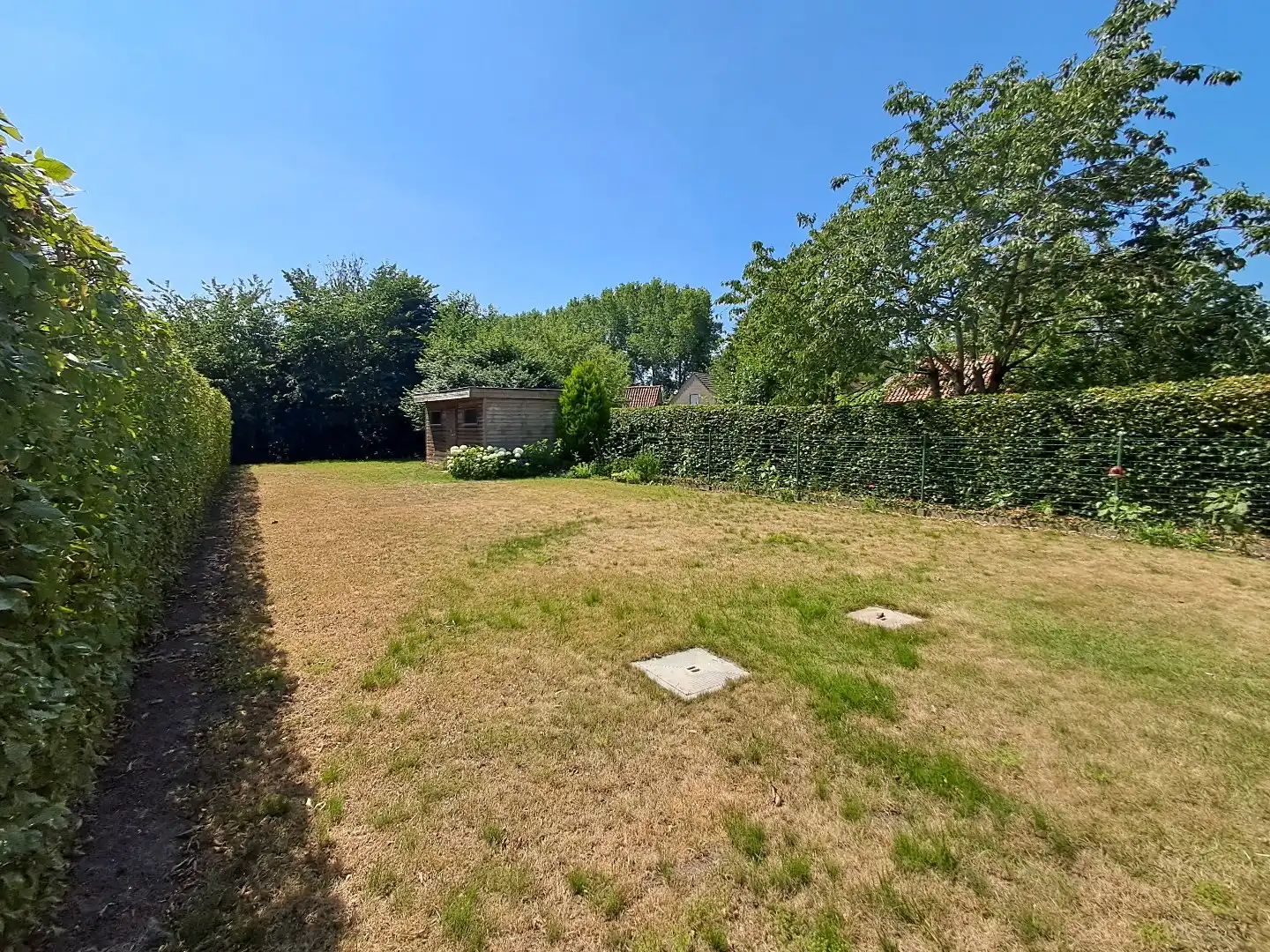 Instapklare halfopen woning met ruime zonnige tuin te Oedelem! foto 22