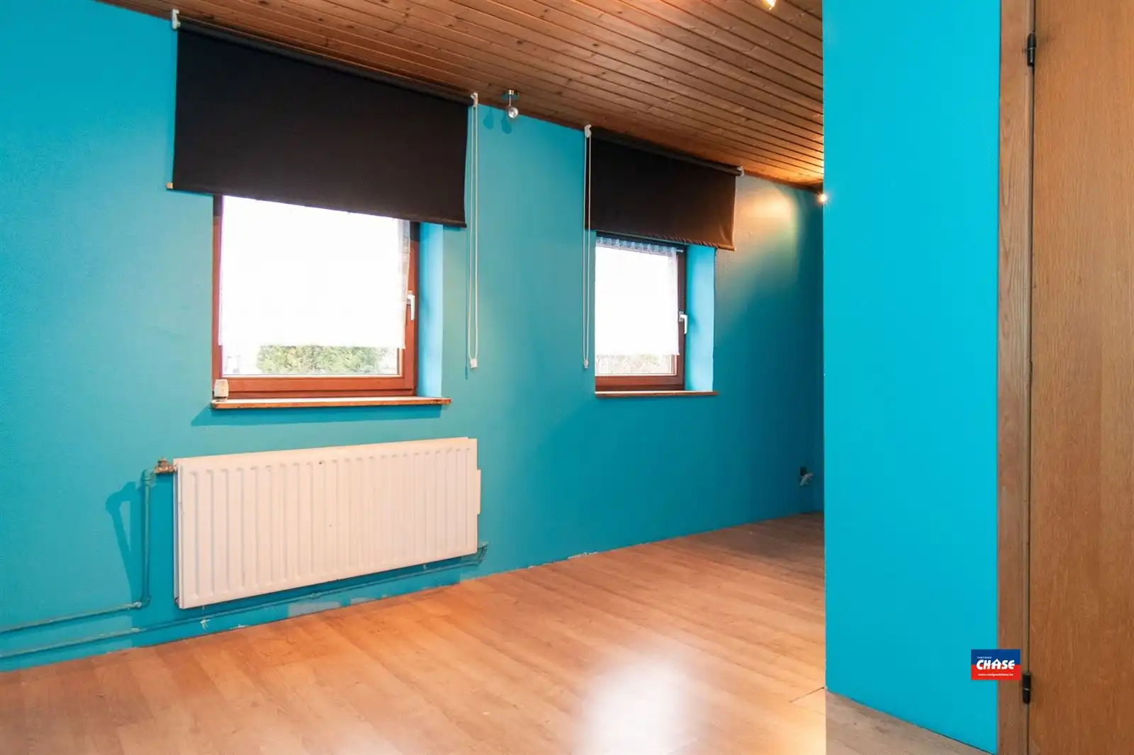 Te renoveren rijwoning met magazijn foto 7