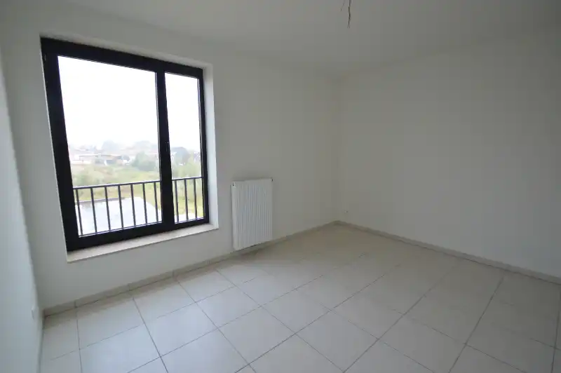 Modern 2-slaapkamerappartement met garage op rustige, groene ligging foto 11