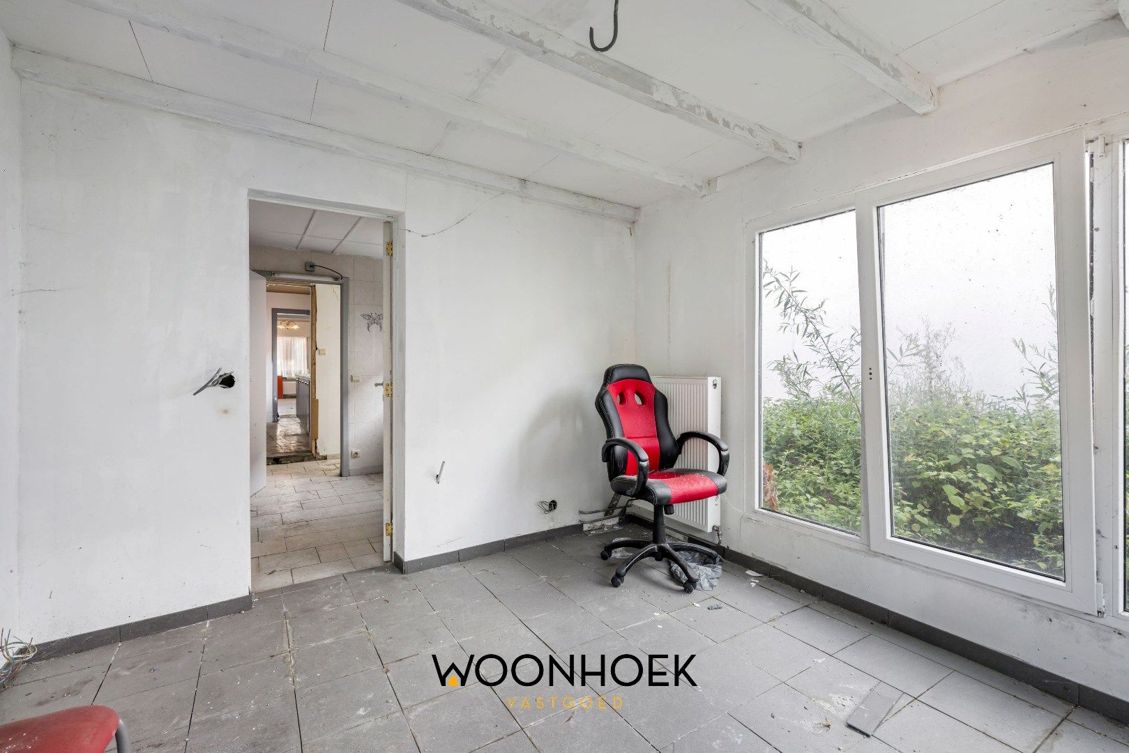 Te renoveren woning in centrum Overmere foto 7