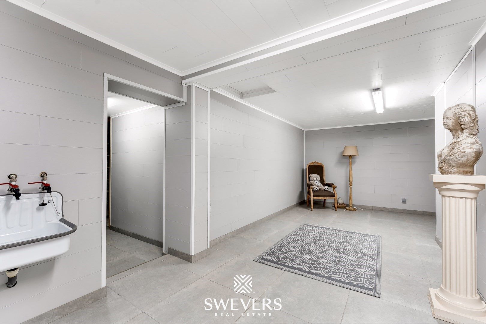 Instapklare woning met handelszaak en appartement in Geetbets foto 38