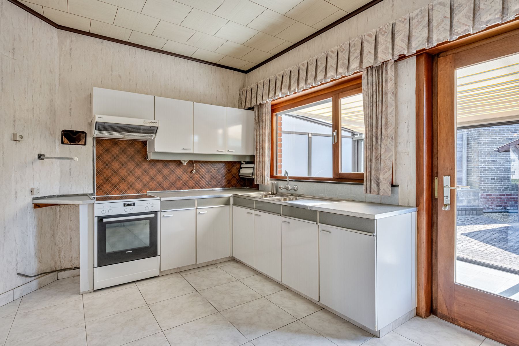 BOTTELARE: te renoveren woning met zuidwest gerichte tuin foto 10