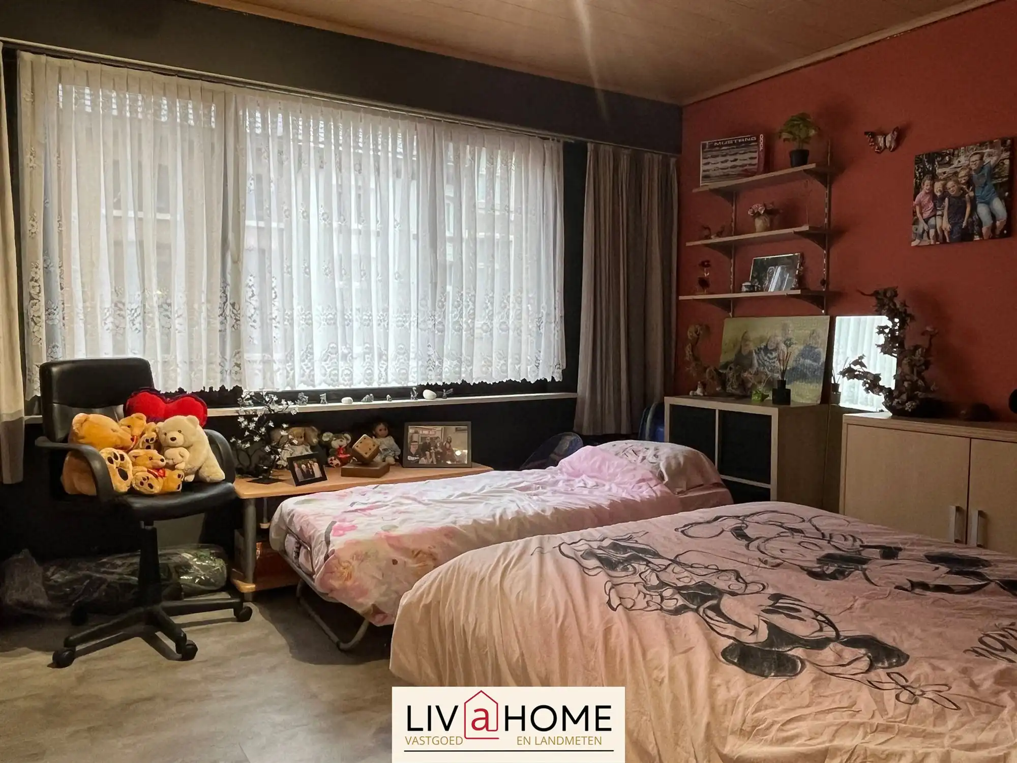 2 aangrenzende rijwoningen met gemeenschappelijke tuin foto 15