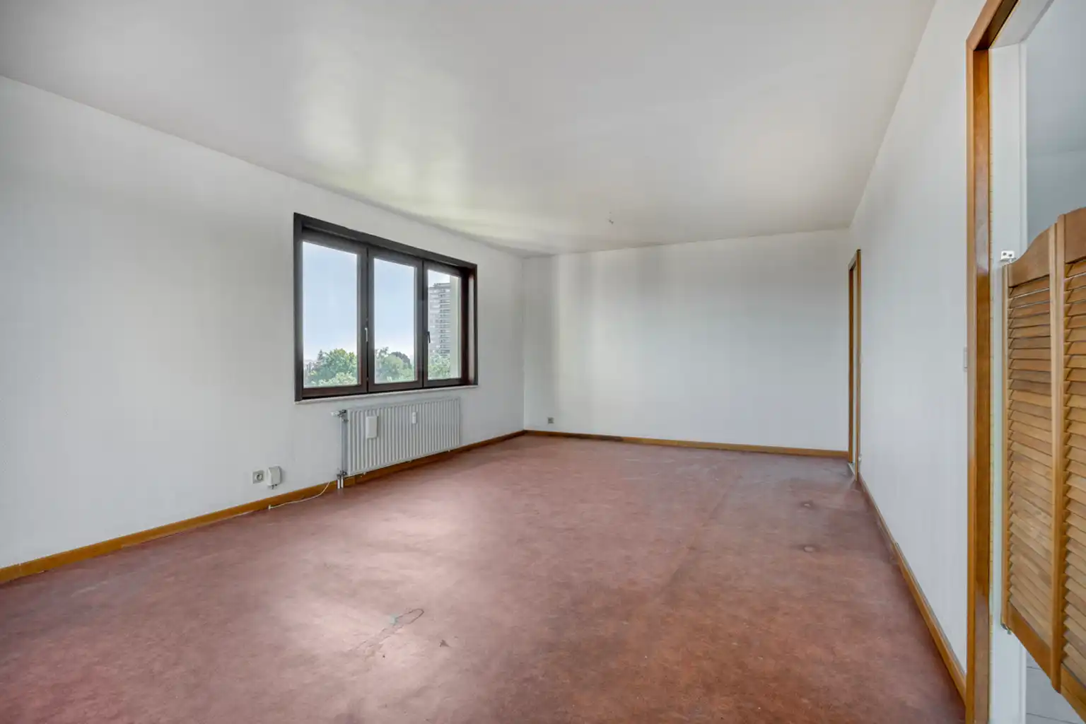 Ruim 3-slaapkamerappartement met garage op toplocatie foto 7