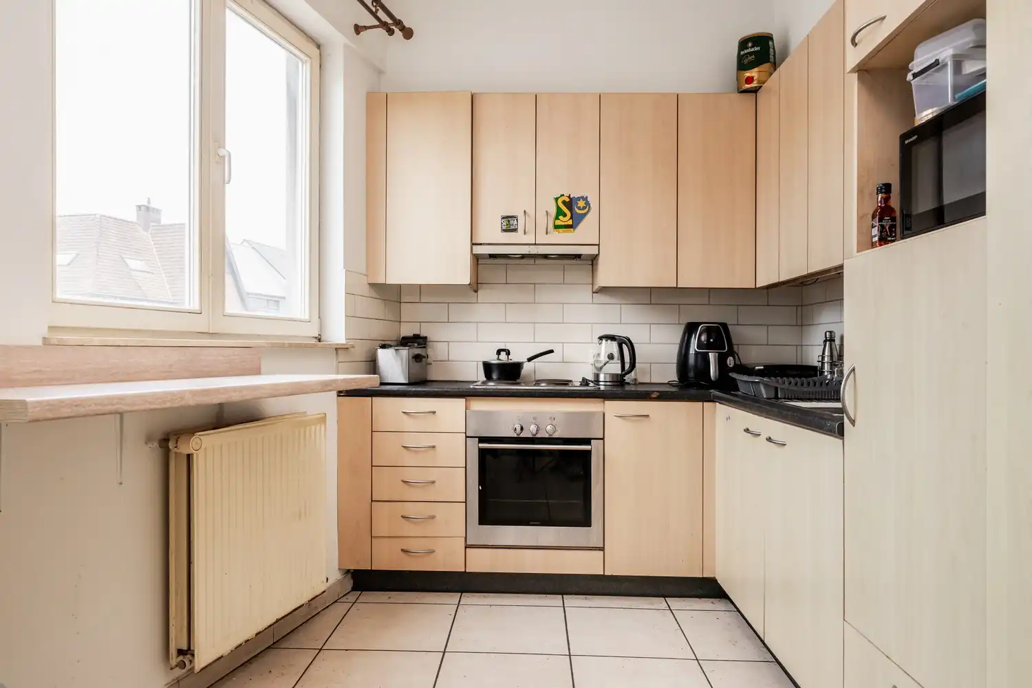 Lichtrijk appartement op de dakverdieping foto 2