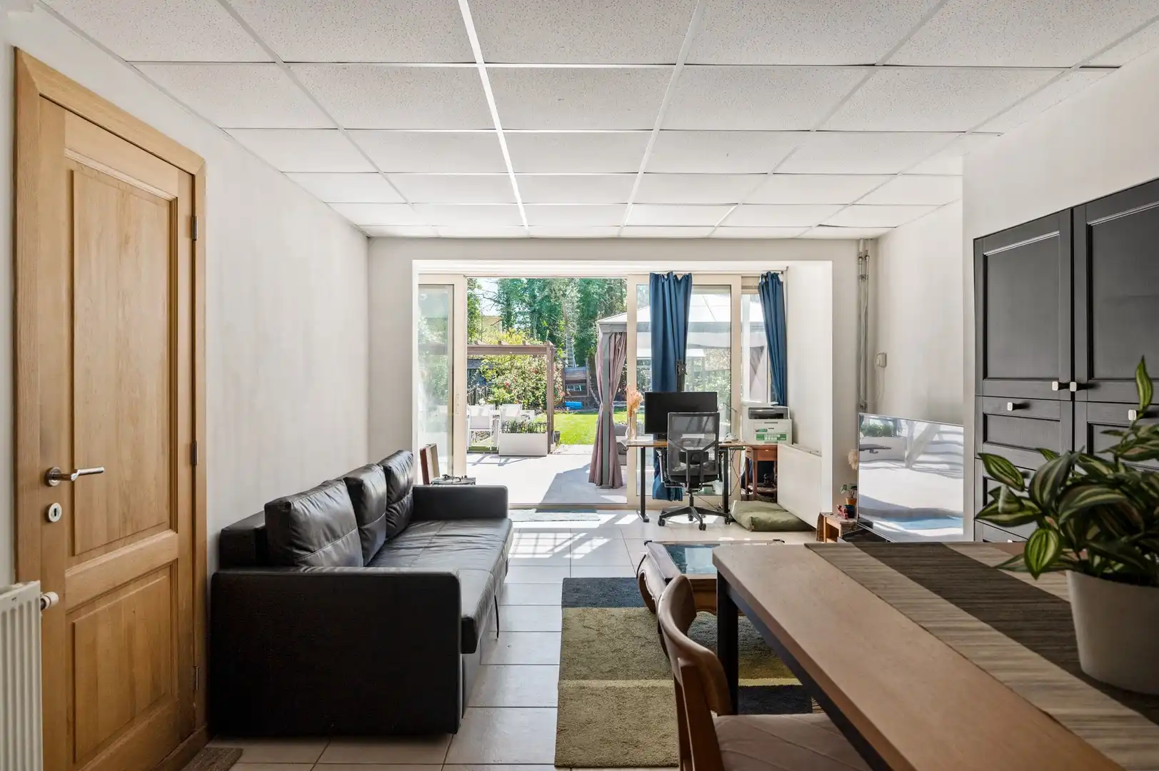 Ruime woning met tuin, polyvalente ruimte en zonnige tuin foto 11