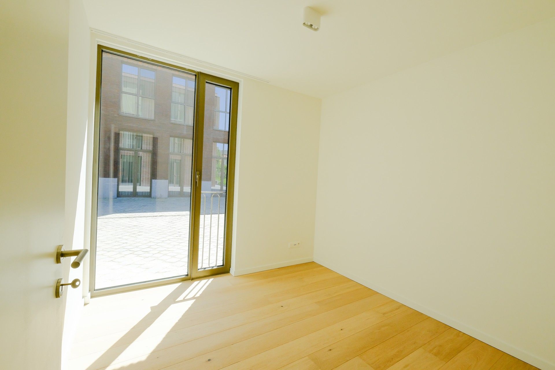 Nieuwbouwappartement met 2 slaapkamers in het charmante Oud-Rekem foto 14