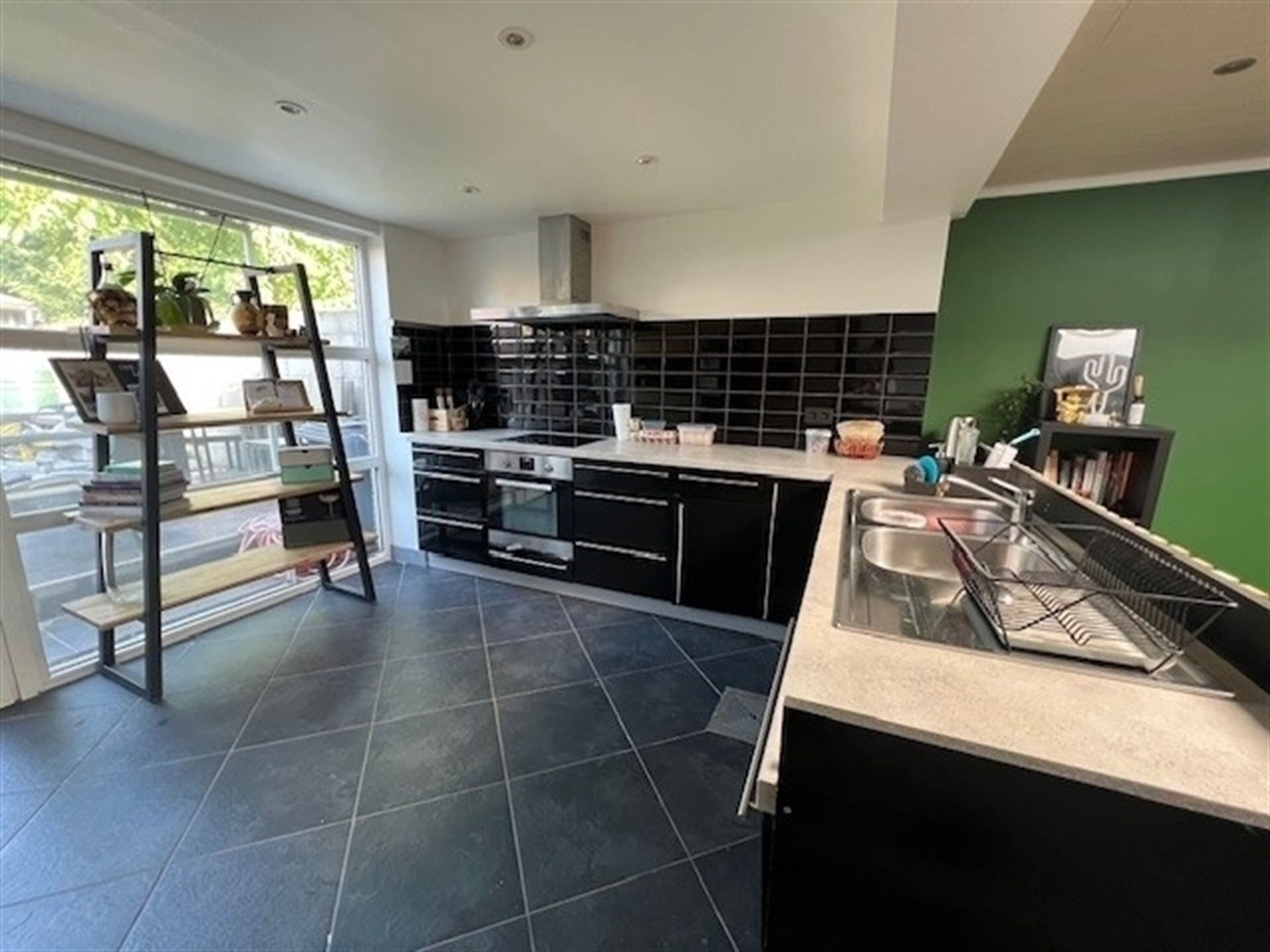 Gezellige woning met tuin en garage! foto 9