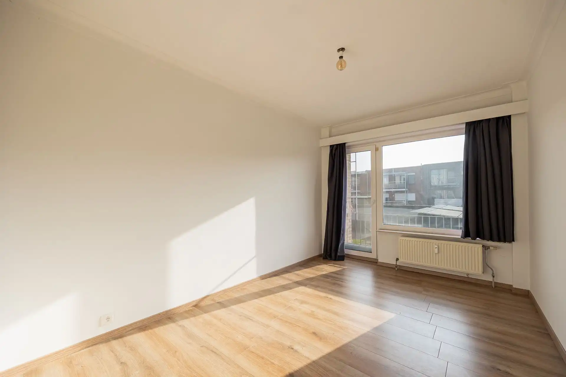 Instapklaar, lichtrijk appartement met terras en staanplaats foto 11