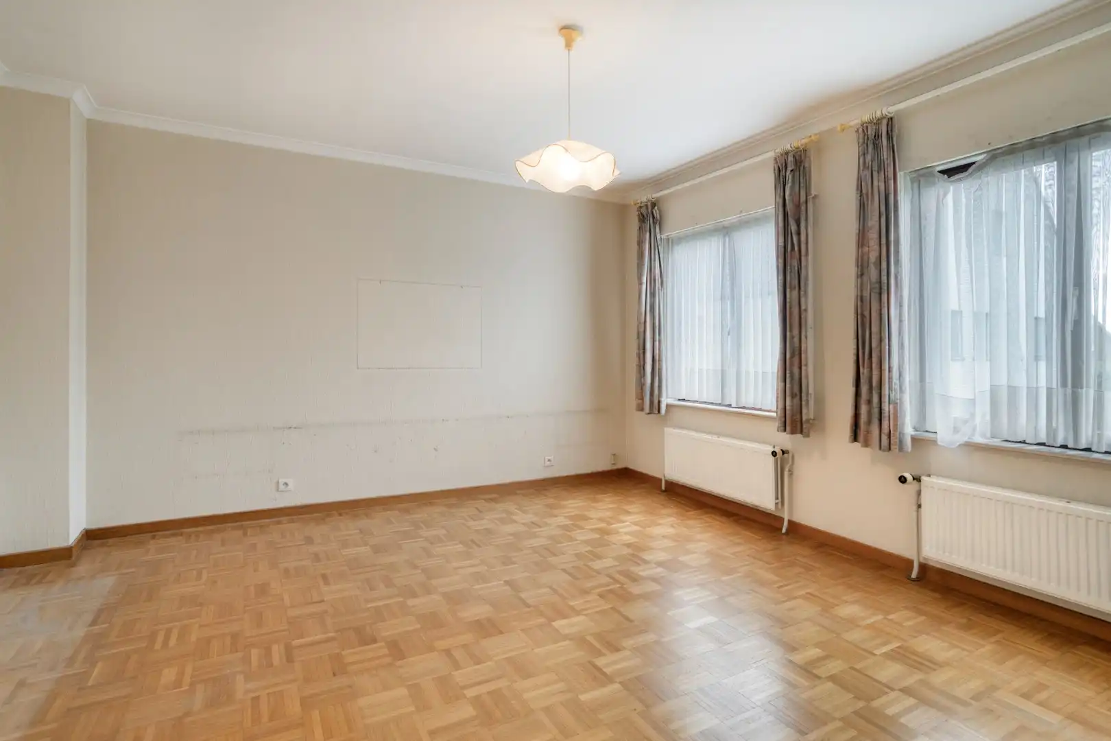 Degelijke woning met 4 slaapkamers, garage en tuin! foto 9
