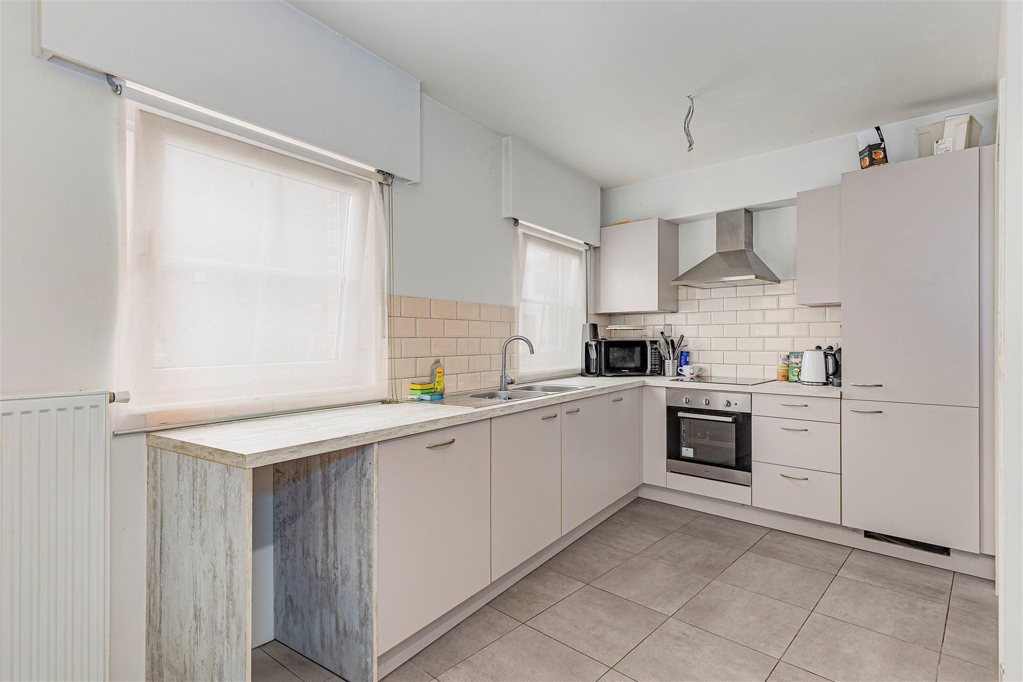 Lichtrijk appartement met 2 slpk, een tuin en garagebox in Bazel foto 3