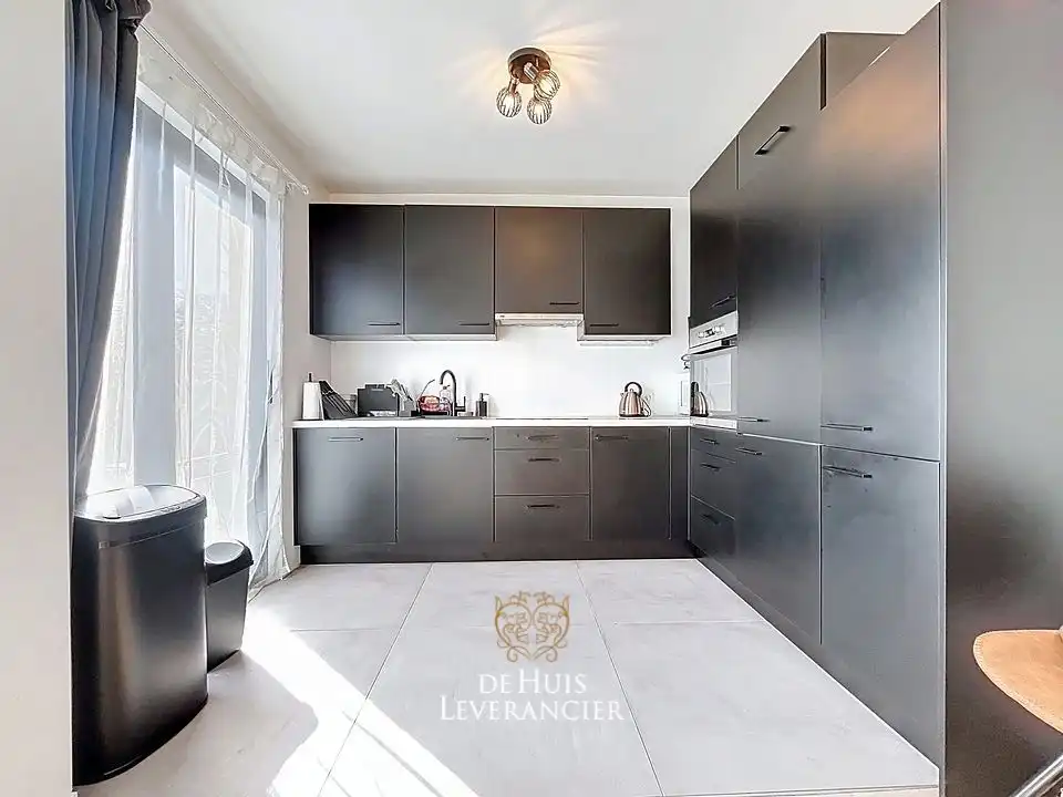 Groot appartement met 2 slpks en staanplaats te koop in centrum Kontich foto 5