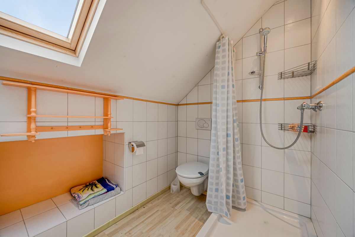 Karaktervolle stadswoning met handelsruimte, tuin en ruime garage in hartje Tongeren foto 17