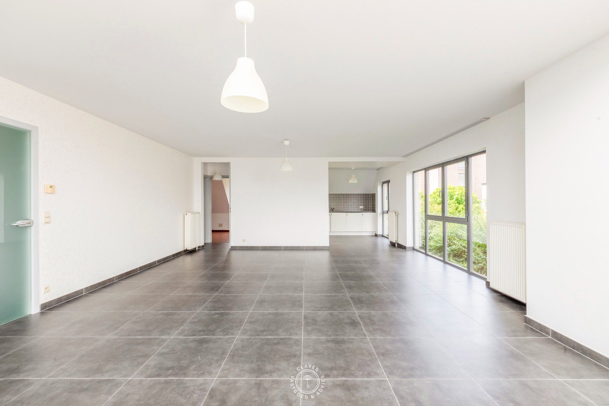 Instapklaar duplexappartement met 3 slaapkamers in Temse foto {{pictureIndex}}