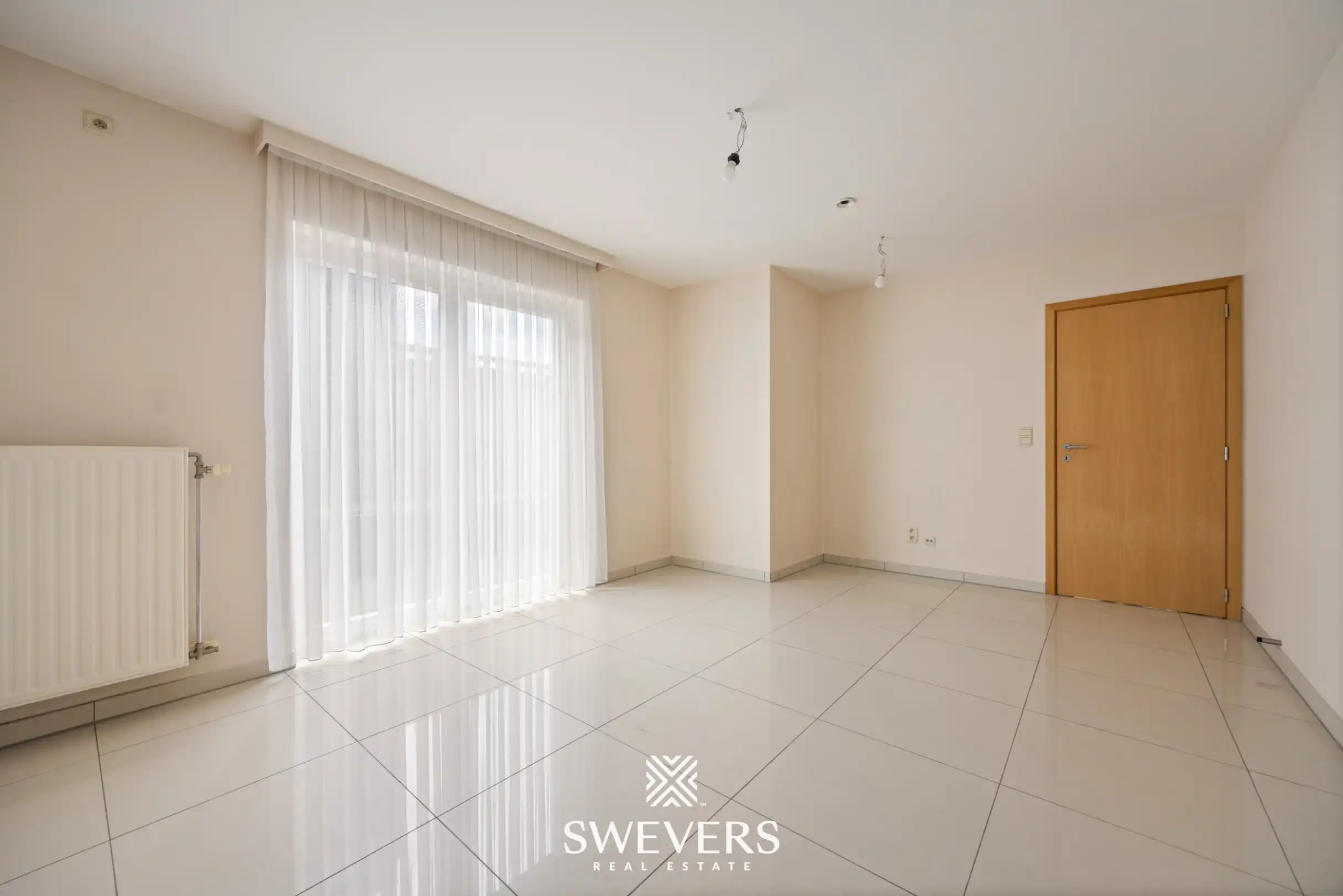 Uitstekend gelegen gelijkvloers appartement met 2 slaapkamers en private tuin foto 10