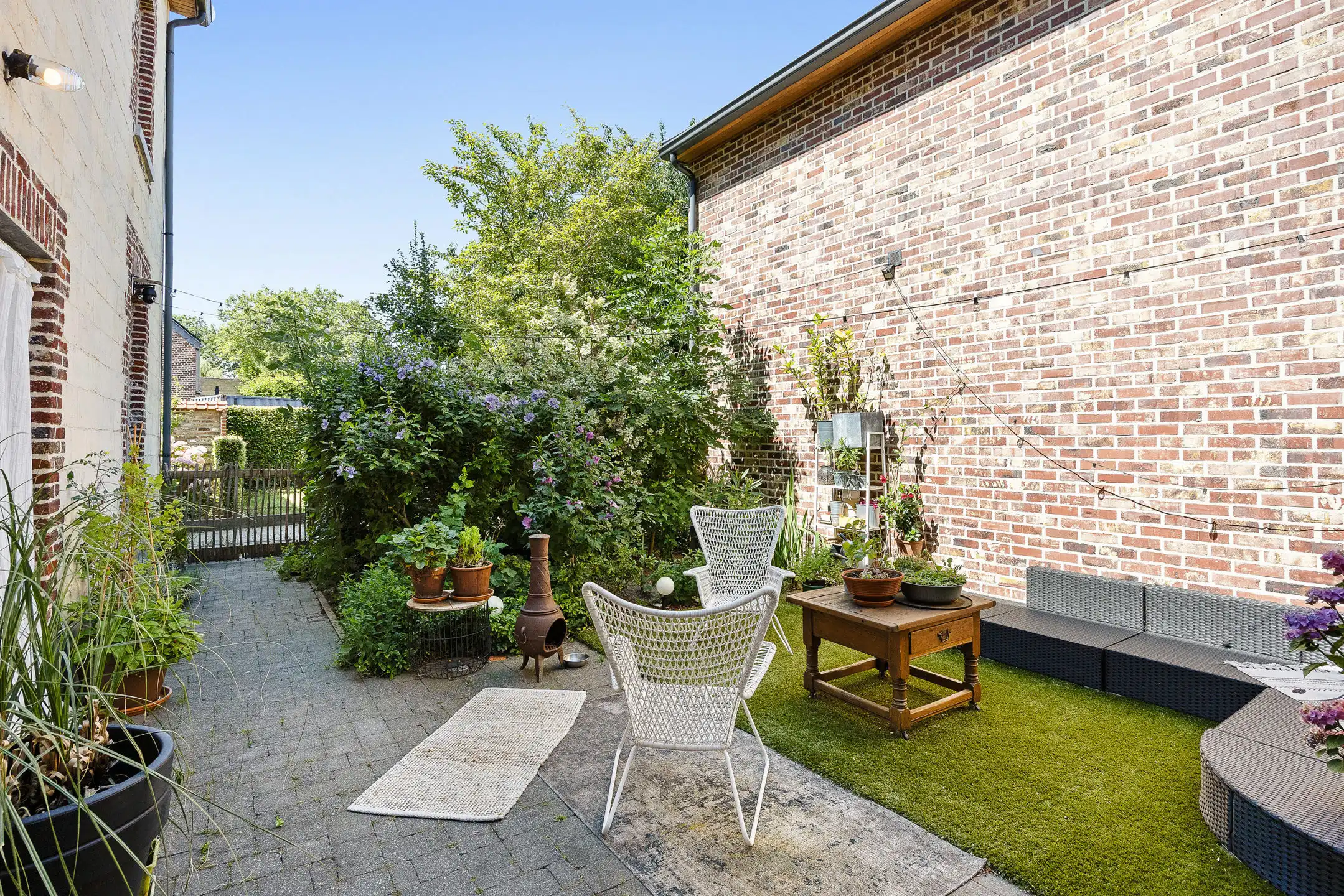 Gelijkvloers appartement met terras/tuin en garage foto 18