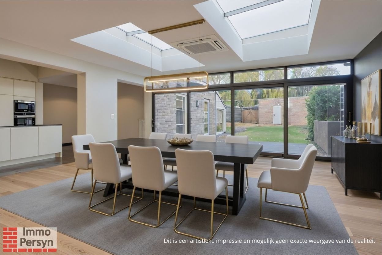 Ruim gelijkvloers appartement met tuin en 2 staanplaatsen. foto 2