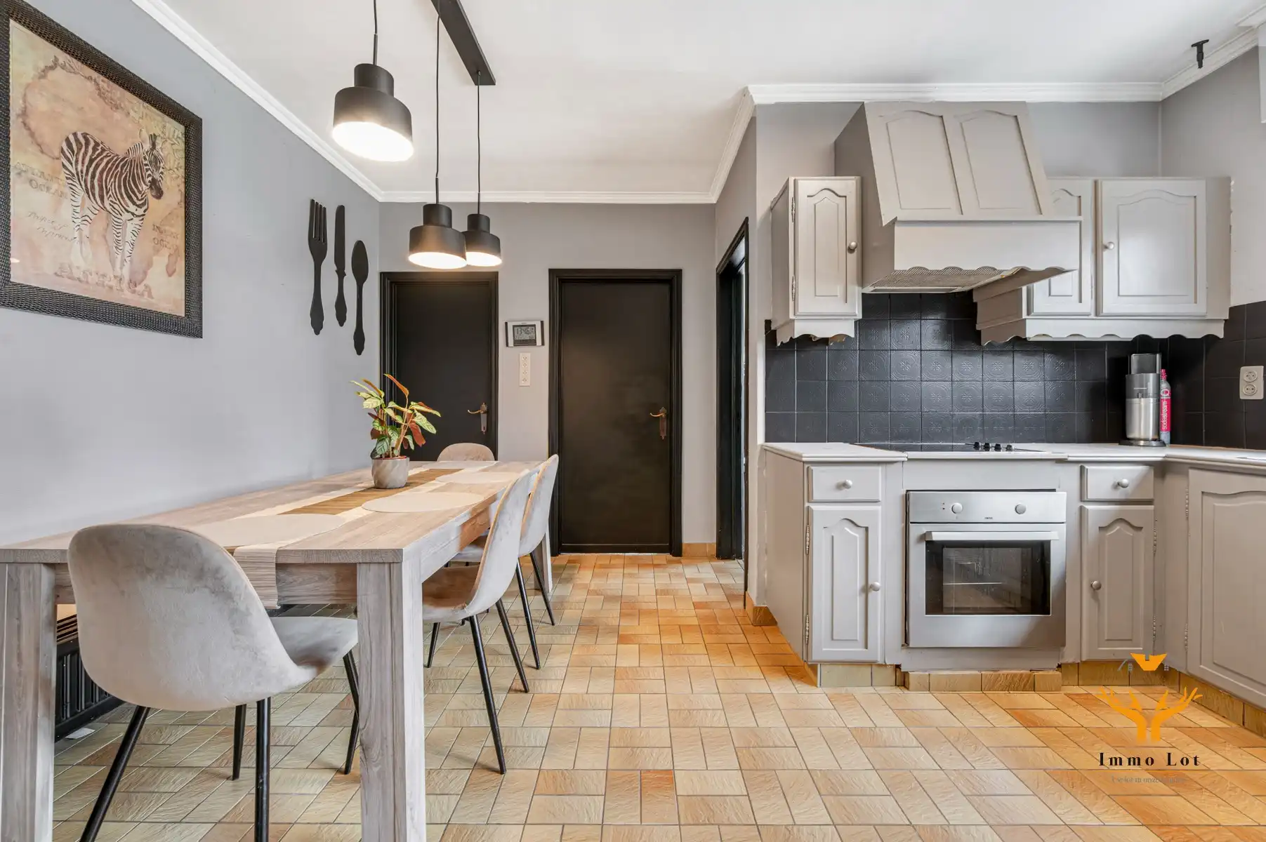 Halfopen bebouwing met tuin en garage in centrum Kalken foto 7