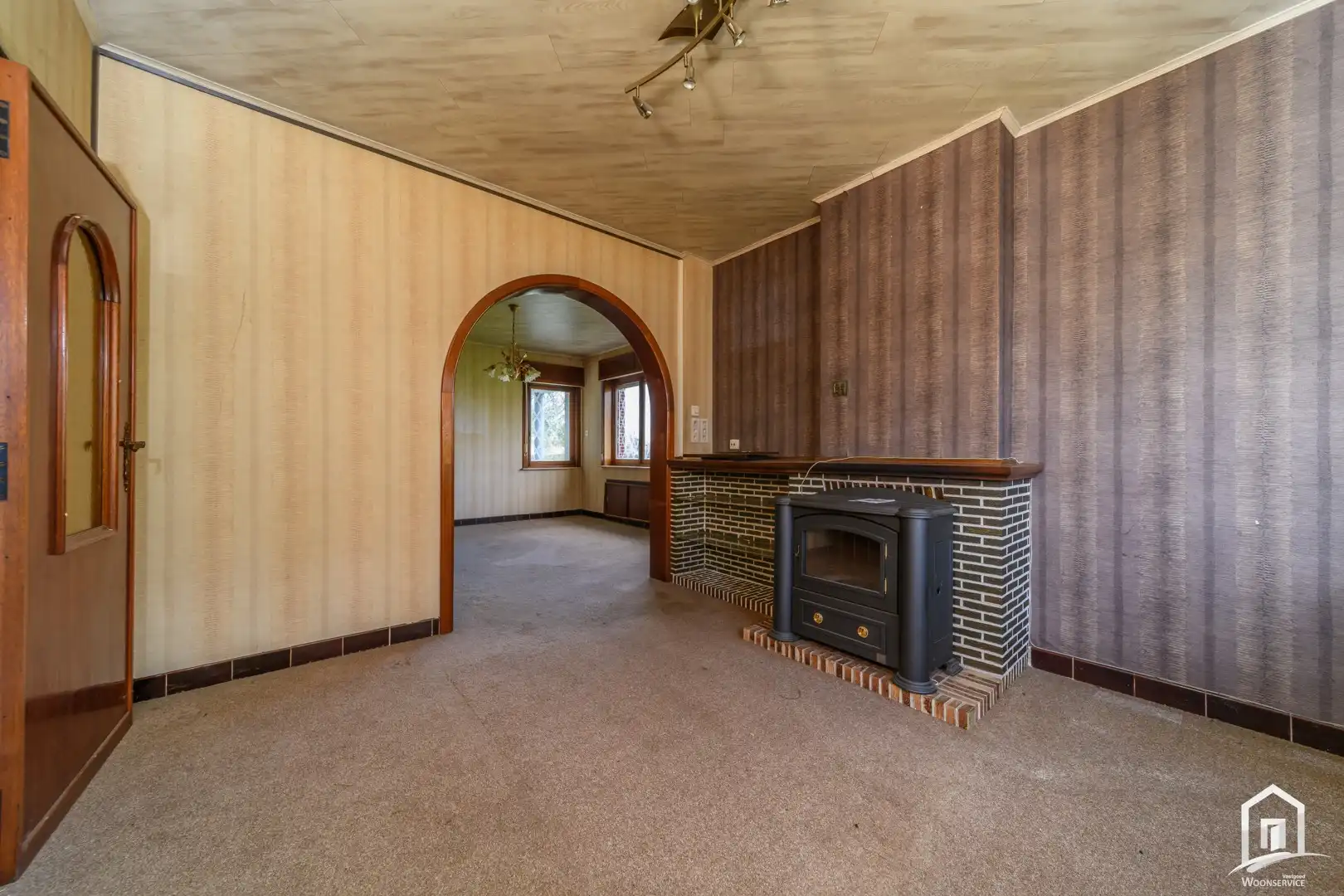 Te renoveren gezinswoning met 2 slaapkamers en ruime tuin foto 3