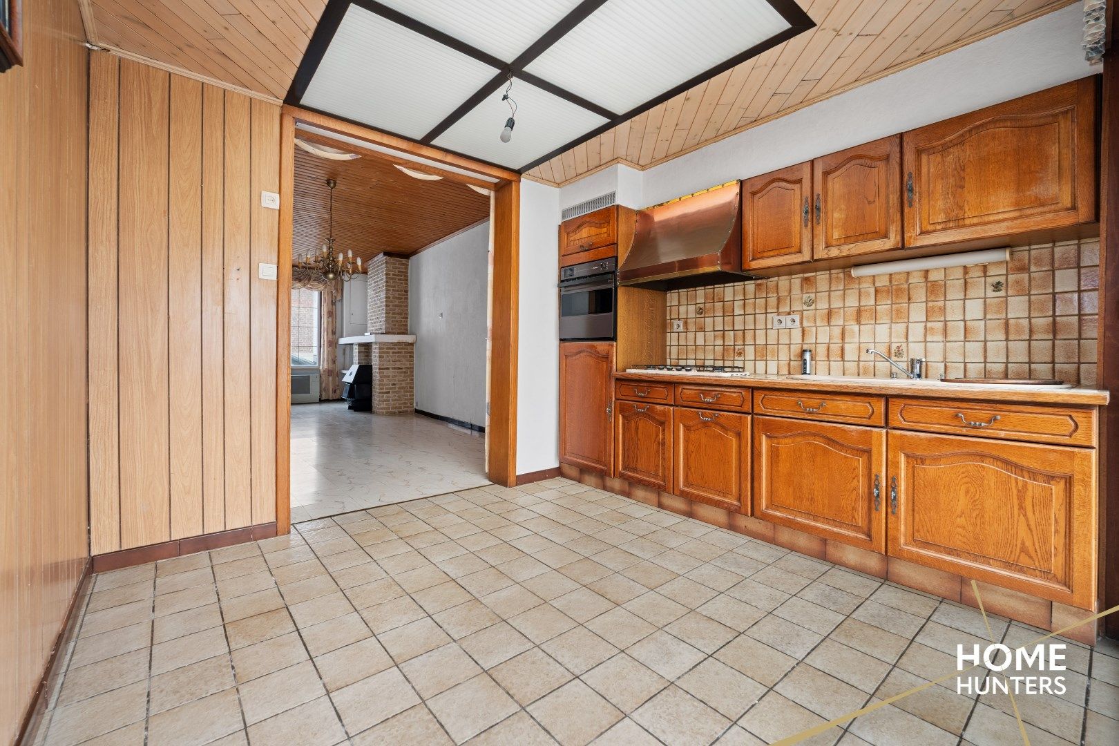 Woning met uitgestrekte tuin in de stadskern van Mesen foto 11