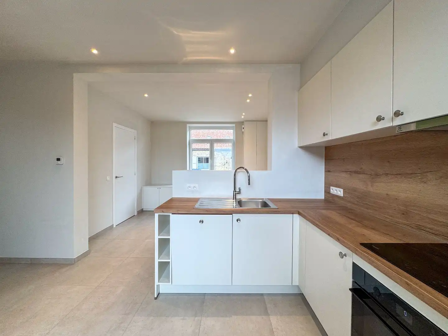 Gezellige woning met 2 slaapkamers, dressing en tuin. foto 11