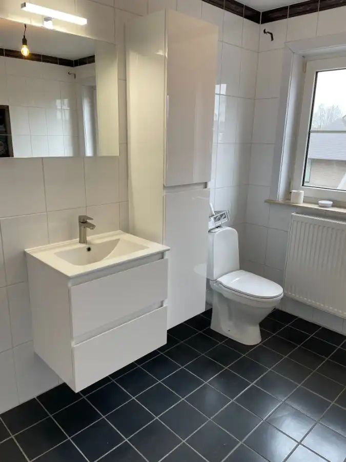 EENGEZINSWONING met tuin & garage foto 17