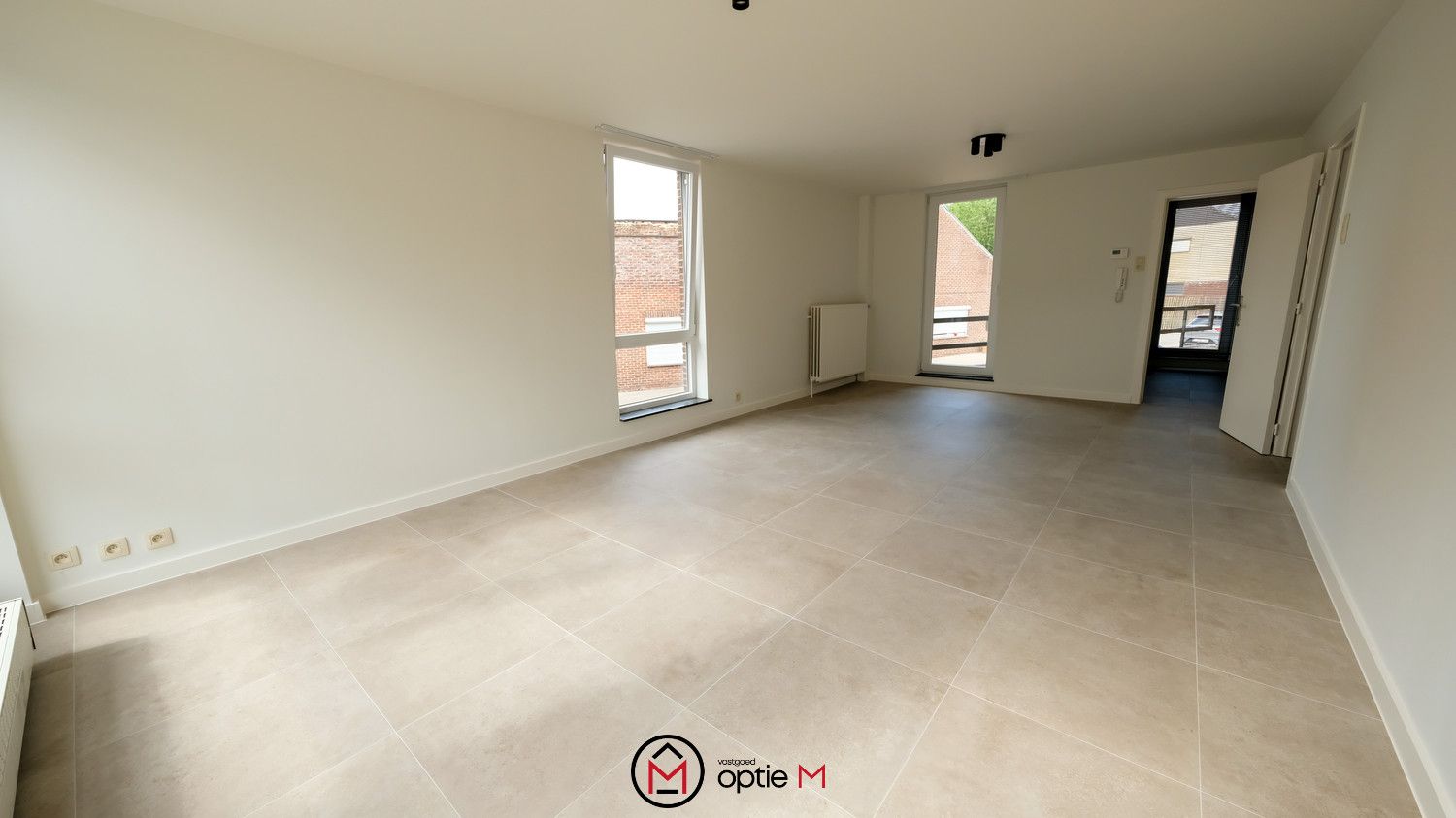RUIM APPARTEMENT MET 3 SLAAPKAMERS, TERRAS EN GARAGEBOX foto 3