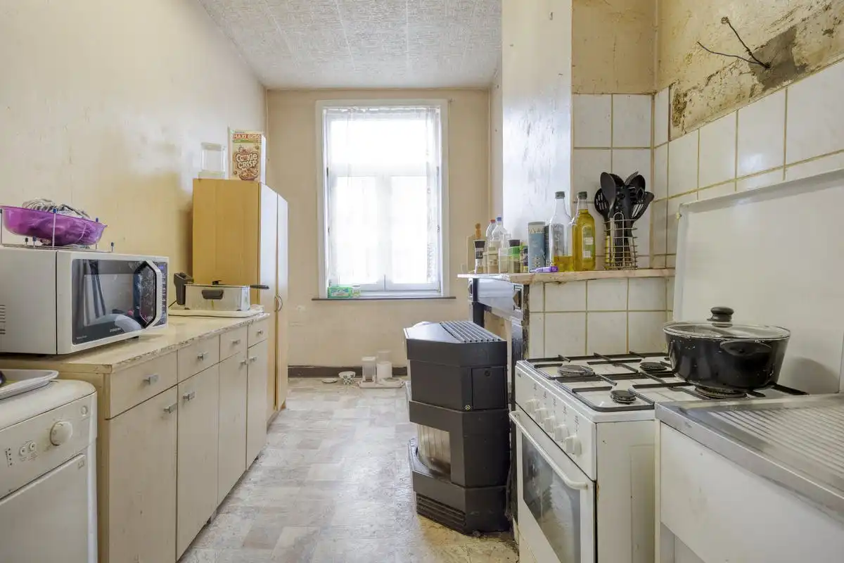 Opbrengsteigendom met renovatiepotentieel in Anderlecht foto 36