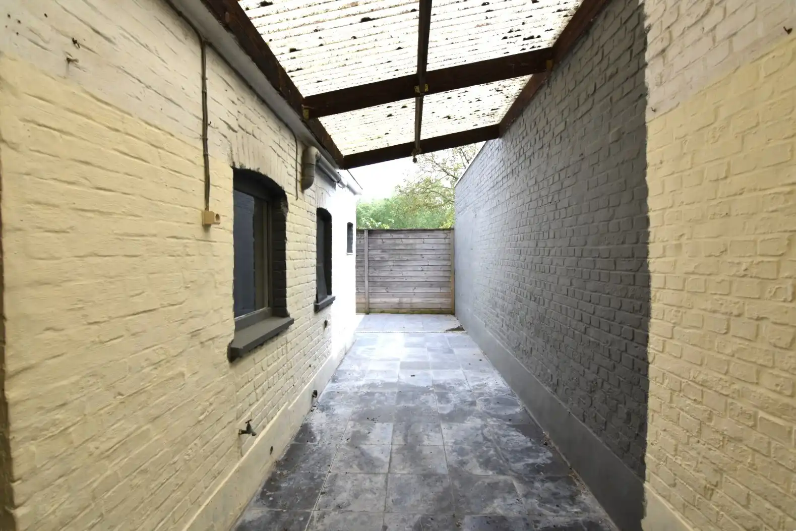 Te renoveren rijwoning met goeie ligging foto 11