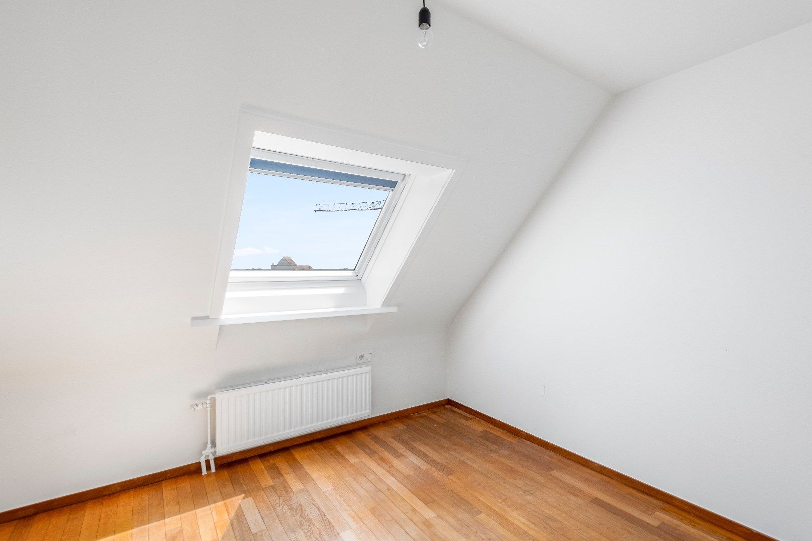 Duplex dakappartement met drie slaapkamers en zonnige terrassen gelegen vlakbij in de Dumortierlaan. foto 18