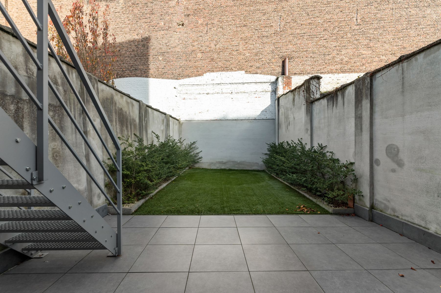 Modern wonen met vibe: stijlvol appartement met tuin foto 11