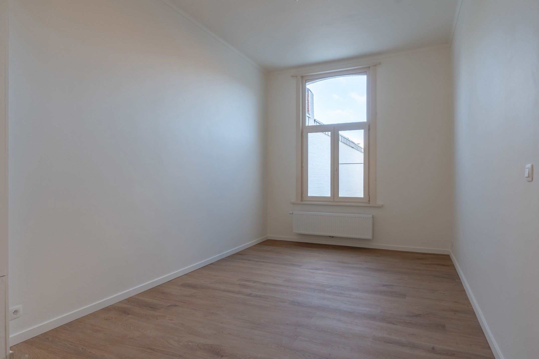 Handelspand met woonst (350m²) op wandelafstand van de Grote Markt. foto 24